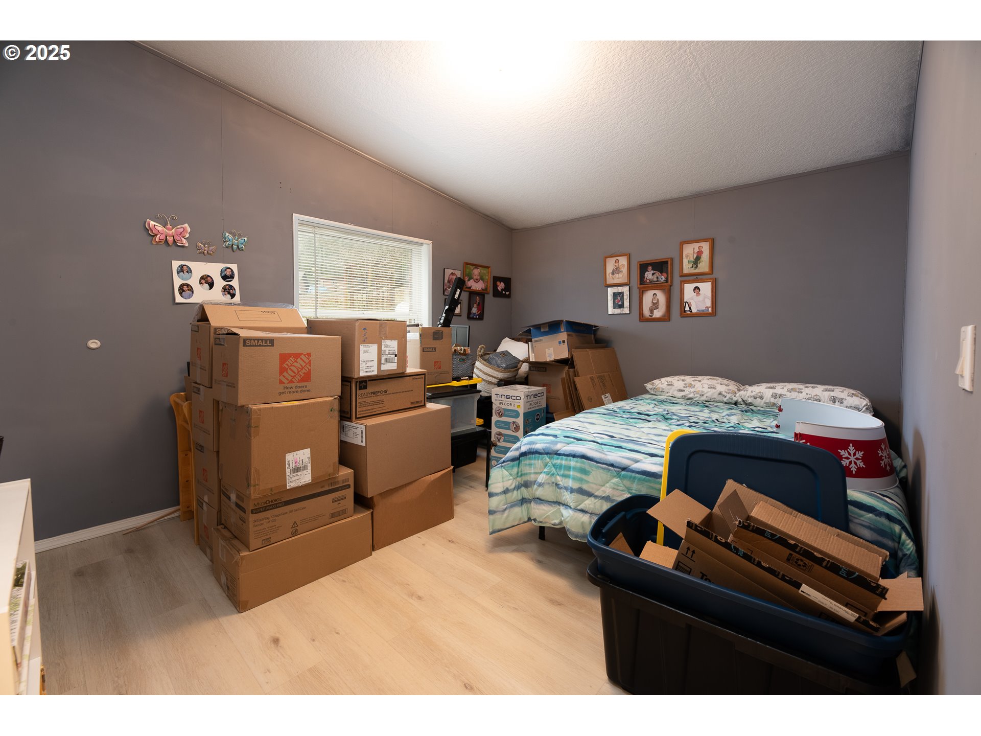 32437 Hidden Valley Road Lebanon, OR 97355 - Photo 19 of 29 a bedroom with a bed and furniture