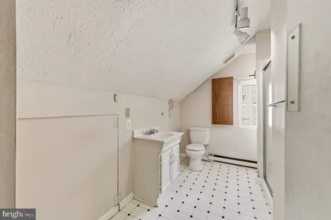 a view of a livingroom with a flat screen tv