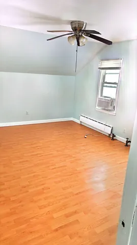 a bathroom with a sink and a window