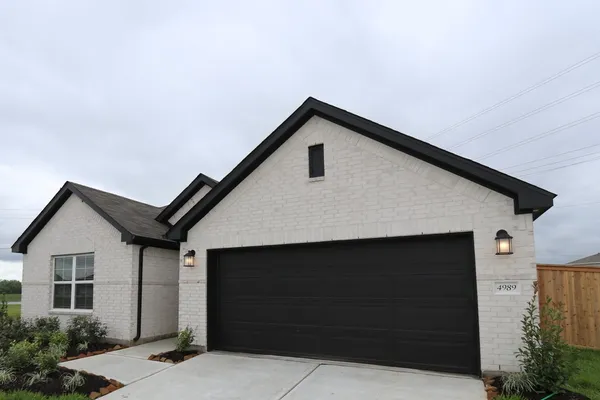 a front view of house with yard