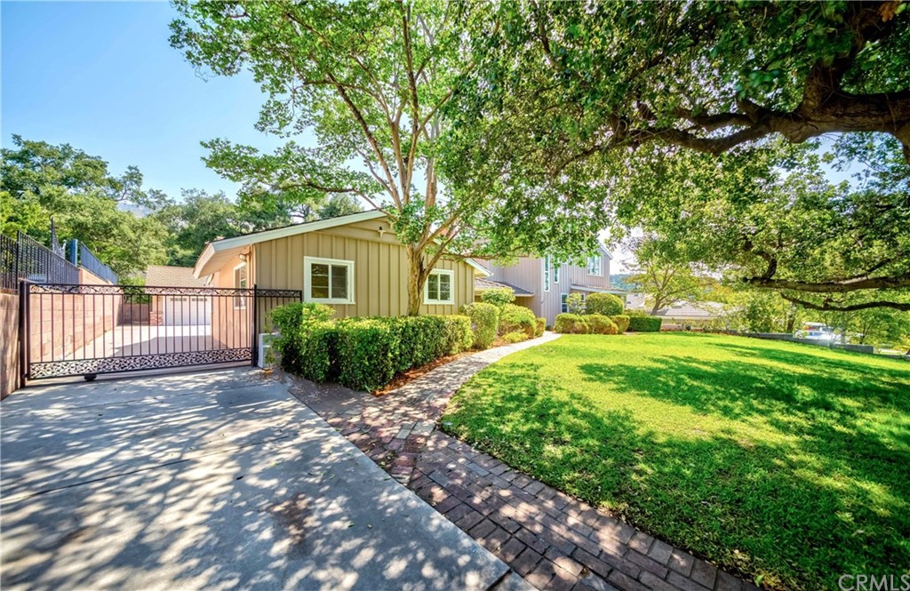 149 White Oak Drive Arcadia, CA 91006 - Photo 2 of 54 a view of a yard with plants and large trees