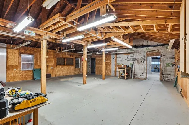 a view of backyard with large trees