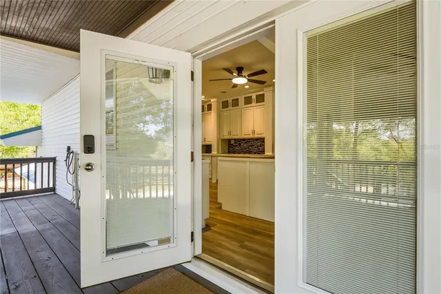 a kitchen with stainless steel appliances granite countertop a sink and a stove