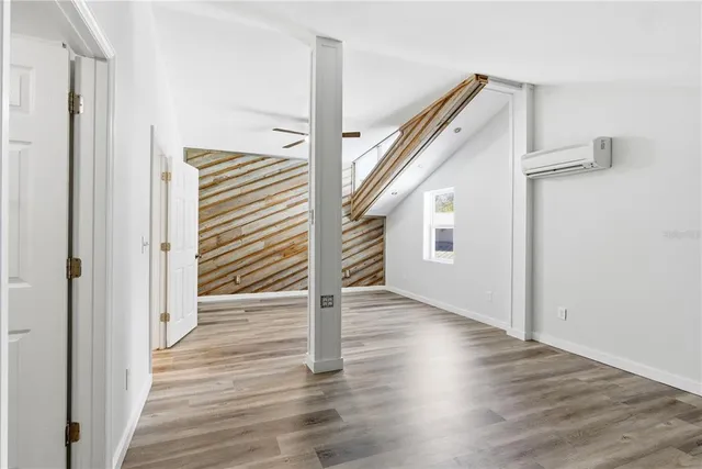 a bathroom with a sink and mirror