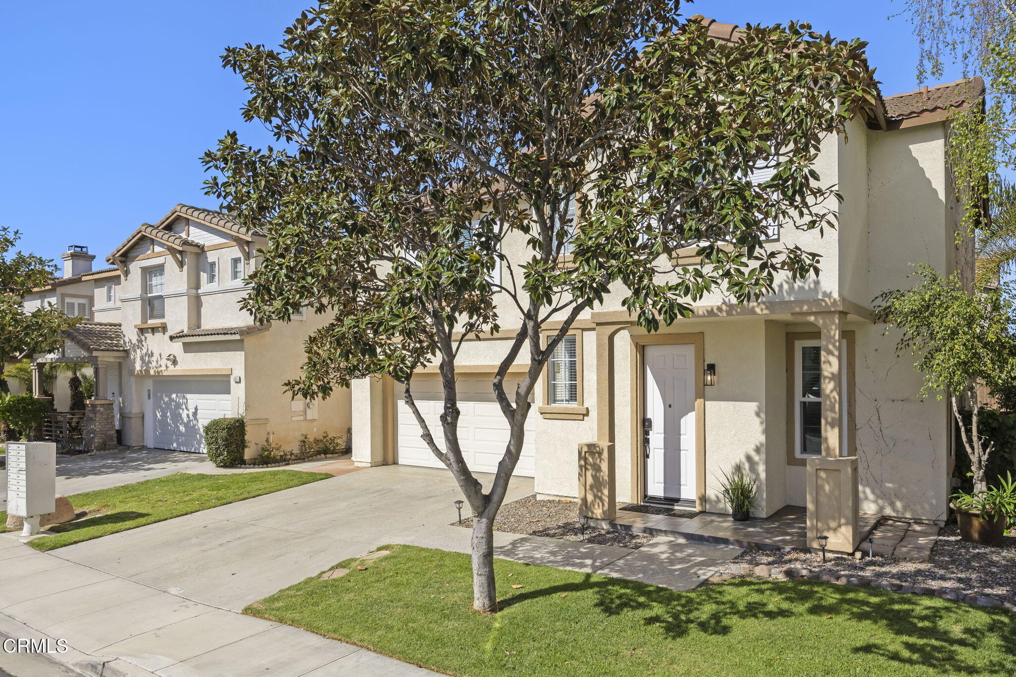 803 Noontide Way Oxnard, CA 93035 - Photo 3 of 44 a front view of a house with garden