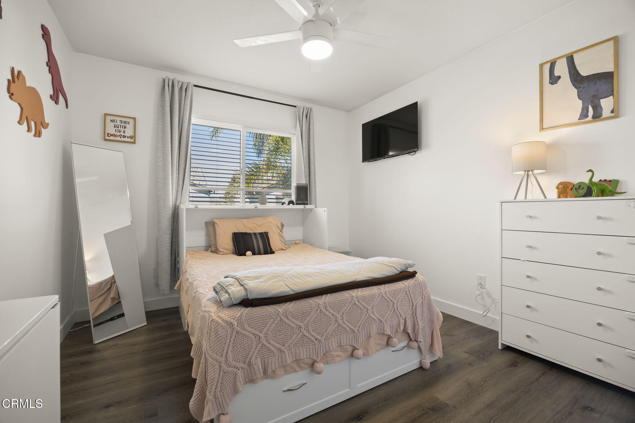 803 Noontide Way Oxnard, CA 93035 - Photo 31 of 44 a bedroom with a bed and a flat screen tv