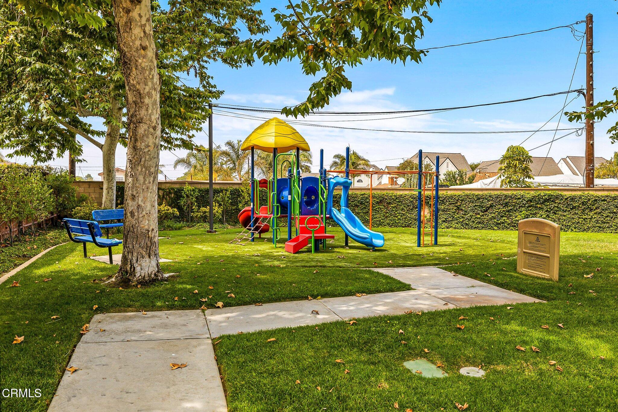 803 Noontide Way Oxnard, CA 93035 - Photo 39 of 44 a view of a park with swings and slides