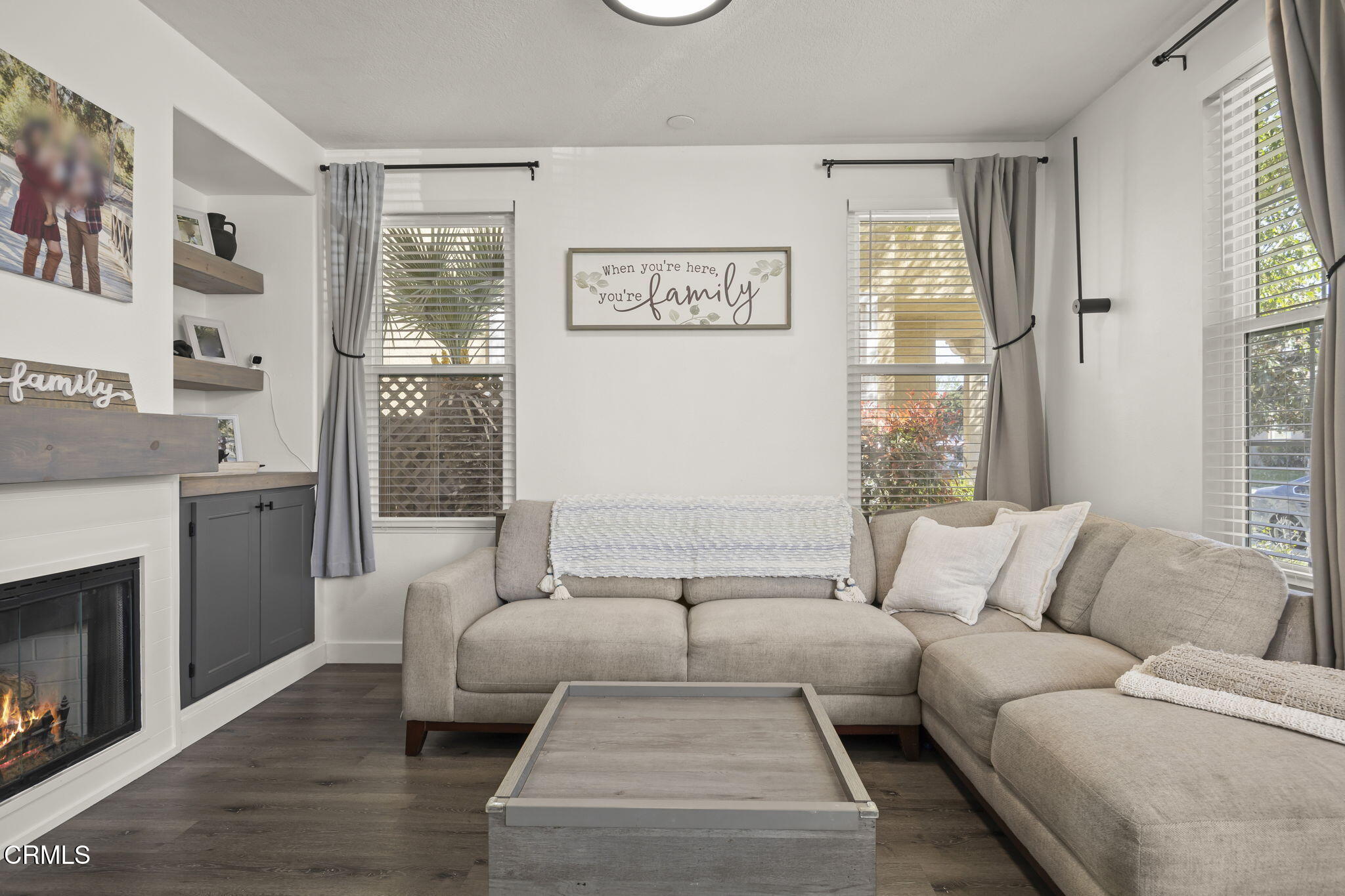 803 Noontide Way Oxnard, CA 93035 - Photo 7 of 44 a living room with furniture and a fireplace