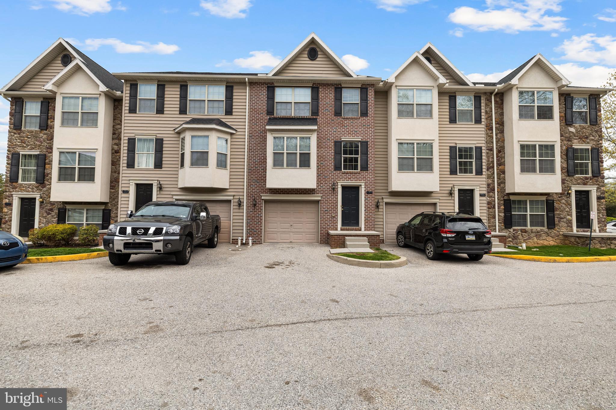 a car parked in front of a house