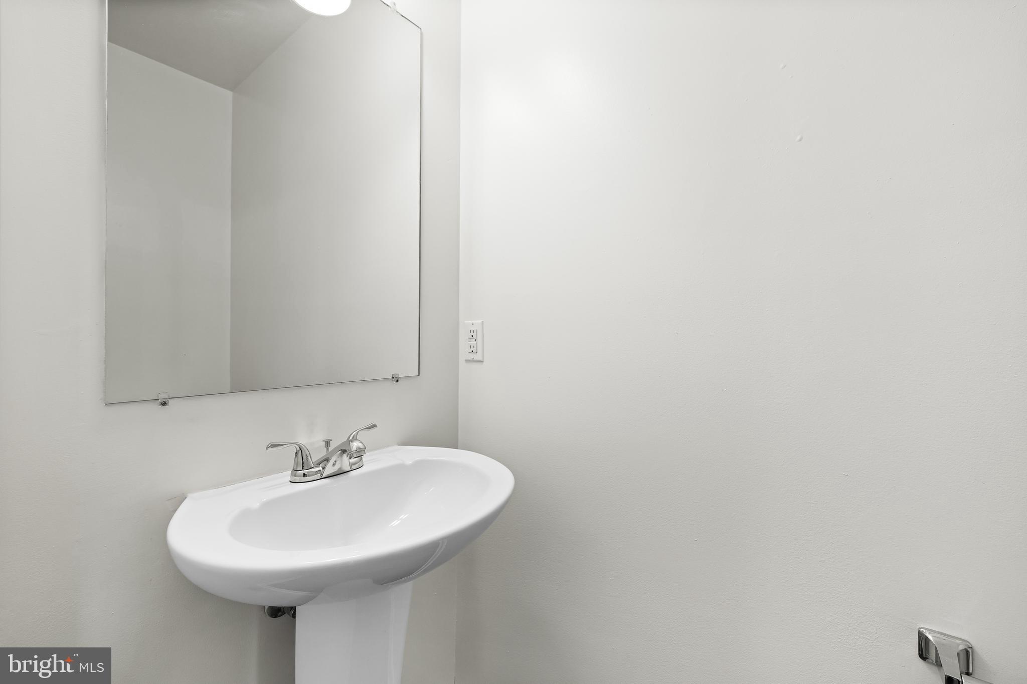 34 Shady Tree Court York, PA 17402 - Photo 13 of 22 a bathroom with a sink and a mirror