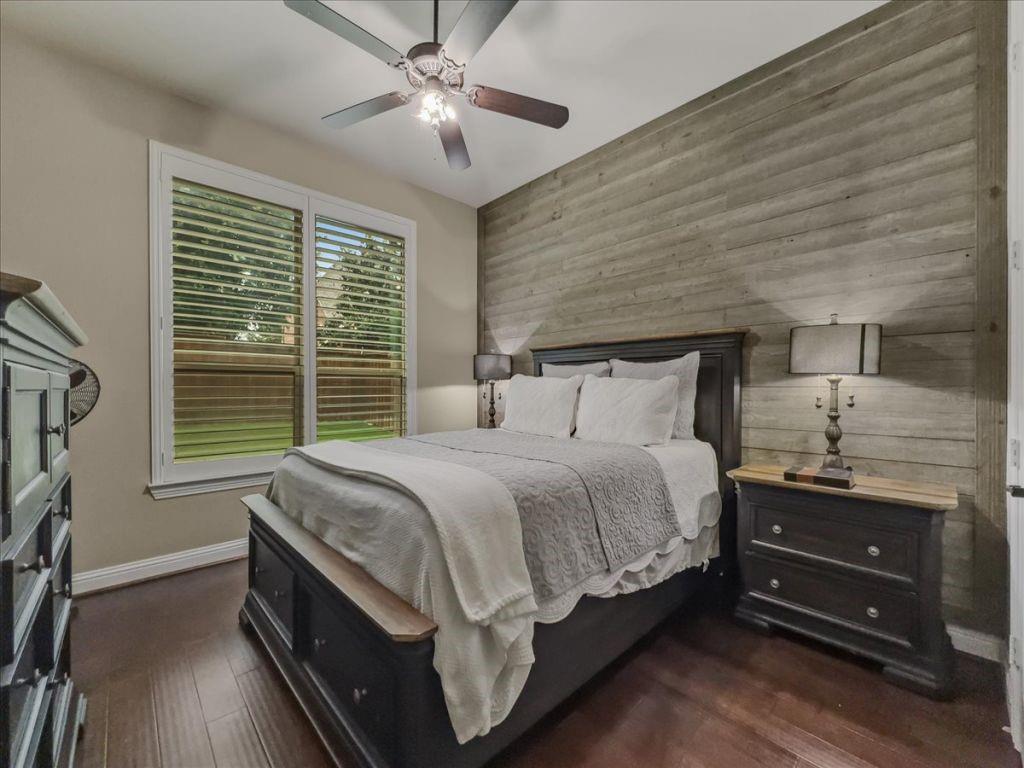 2832 Mona Vale Road Trophy Club, TX 76262 - Photo 22 of 37 a spacious bedroom with a bed and a chandelier