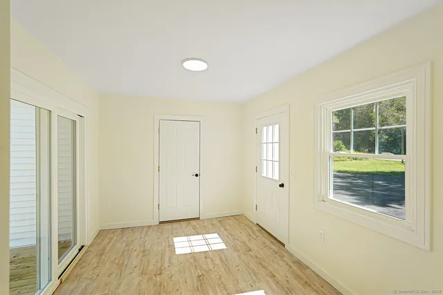 a view of an empty room and window