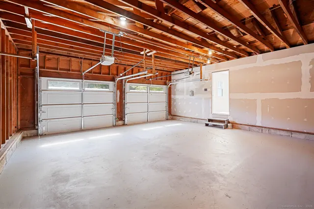 a view of a room with storage and utility room