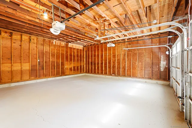 a view of a room with wooden walls