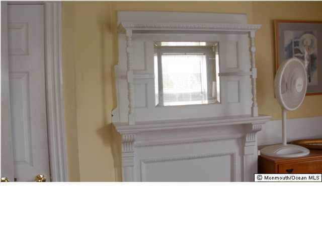 800 Wall Road Spring Lake Heights, NJ 07762 - Photo 3 of 6 a black and white photo of a mirror