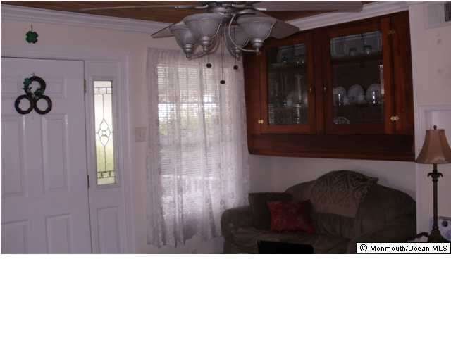 800 Wall Road Spring Lake Heights, NJ 07762 - Photo 4 of 6 a black and white photo of a mirror