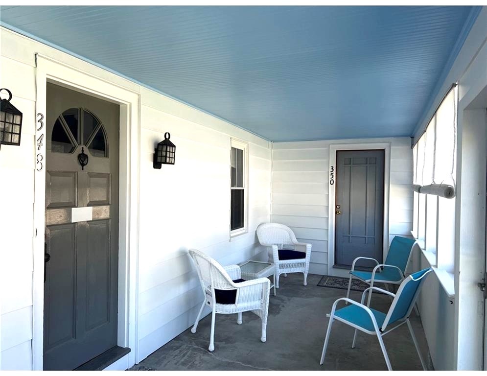 348 Market Street Warren, RI 02885 - Photo 2 of 22 Lovely enclosed porch area that shares both units
