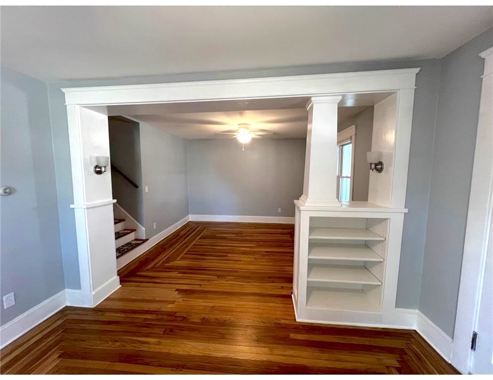 348 Market Street Warren, RI 02885 - Photo 4 of 22 Freshly painted. double dining and living room with ceiling fans, and built-in shelves.