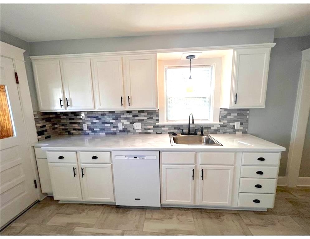 348 Market Street Warren, RI 02885 - Photo 6 of 22 Large eit in kitchen and side access to fenced in yard area for furry friends.