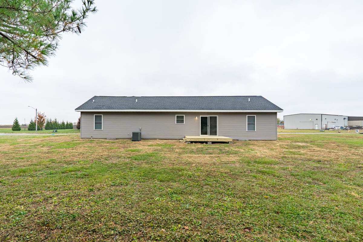 113 Prairie Run Illiopolis, IL 62539 - Photo 22 of 24 a house view with a outdoor space