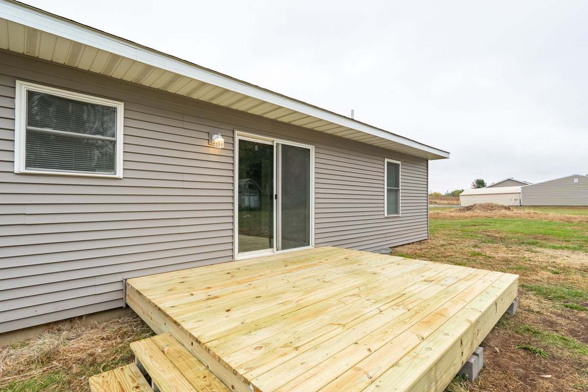 113 Prairie Run Illiopolis, IL 62539 - Photo 23 of 24 a view of a house with a backyard