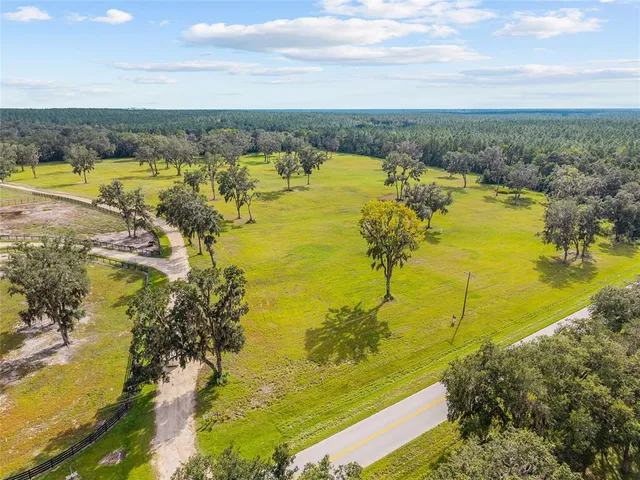 a view of a lake with a big yard