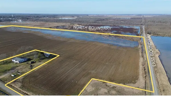 a view of a living room with a floor to ceiling window