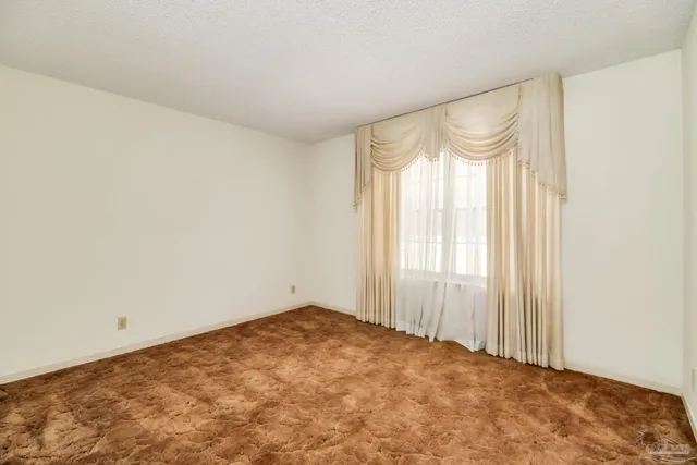 a view of a room with a chandelier
