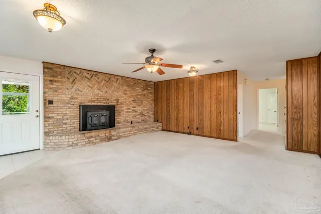 a view of a livingroom with a fireplace