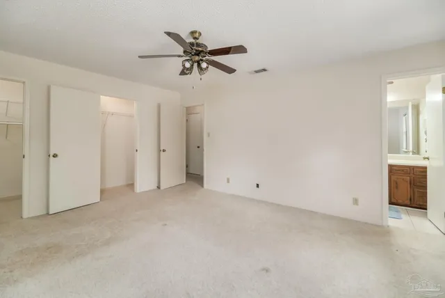 a bathroom with a sink a vanity and a mirror