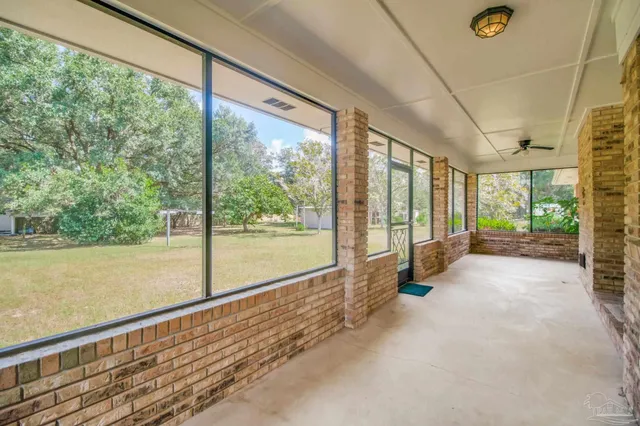a view of a yard with an outdoor space and seating area