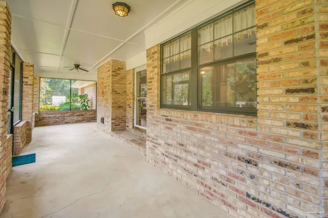 a front view of a house with a big yard