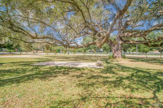 a picture of a bathroom with a bathtub
