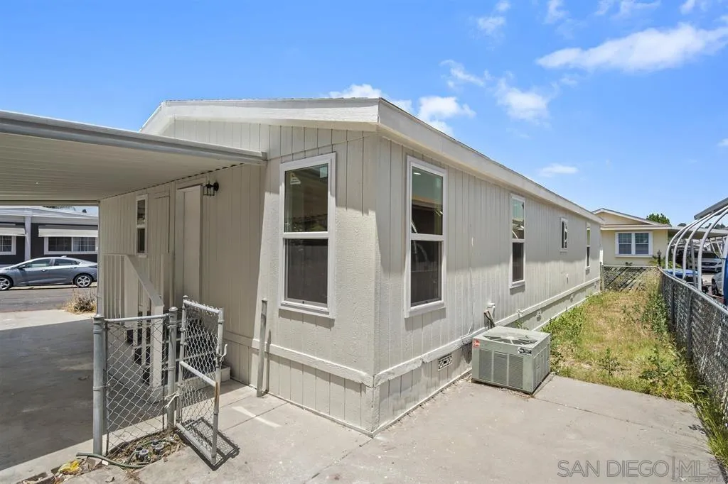 10767 Jamacha Boulevard, Unit SPC 62 Spring Valley, CA 91978 - Photo 23 of 25 a view of a house with backyard and sitting area