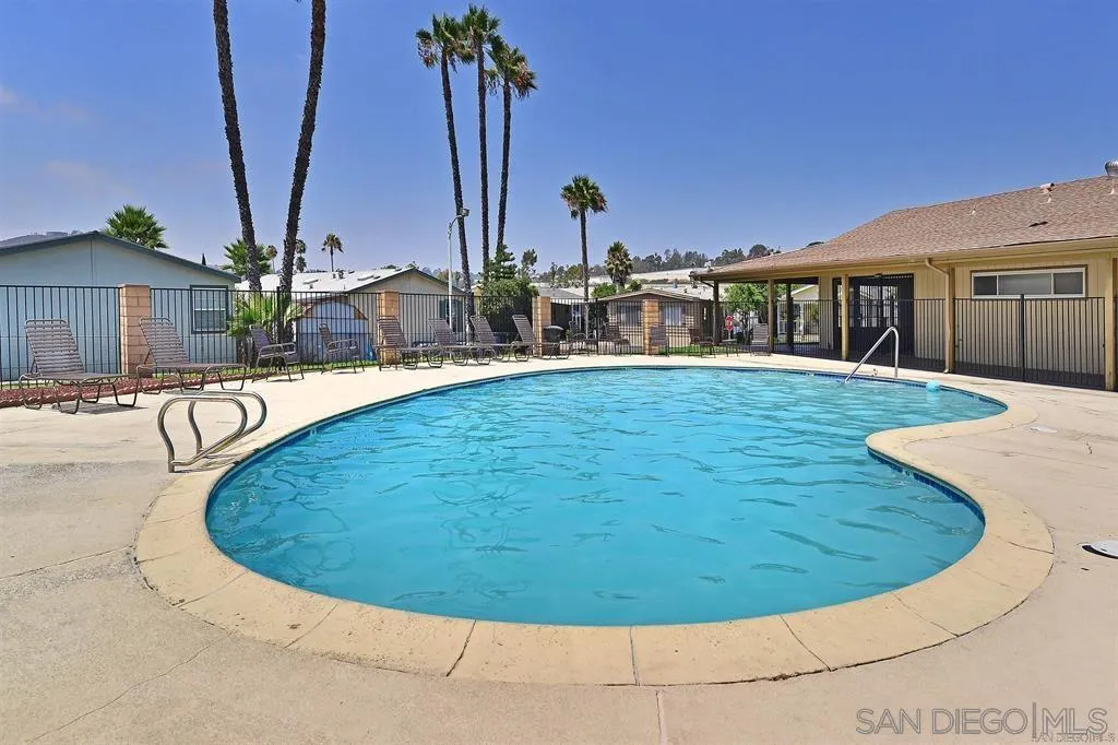 10767 Jamacha Boulevard, Unit SPC 62 Spring Valley, CA 91978 - Photo 25 of 25 a view of a swimming pool with a chairs