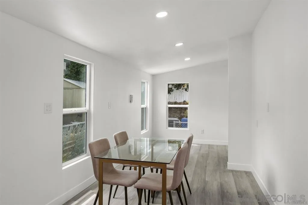 10767 Jamacha Boulevard, Unit SPC 62 Spring Valley, CA 91978 - Photo 10 of 25 a view of a dining room with furniture and wooden floor
