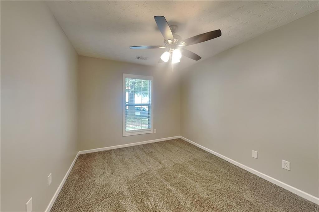 3318 Freedom Landing Northwest Kennesaw, GA 30144 - Photo 11 of 15 a view of an empty room with a window