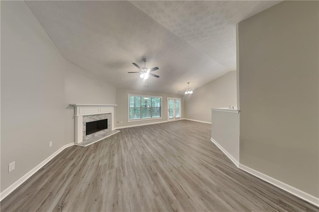 3318 Freedom Landing Northwest Kennesaw, GA 30144 - Photo 2 of 15 a view of empty room with wooden floor and fan