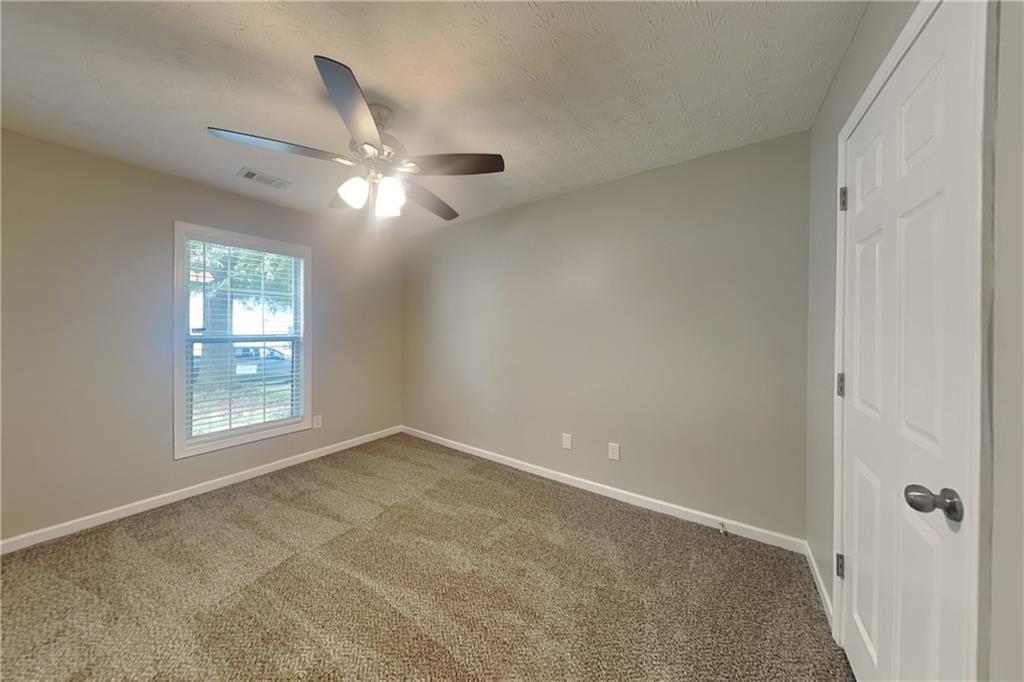 3318 Freedom Landing Northwest Kennesaw, GA 30144 - Photo 10 of 15 a view of an empty room with a window