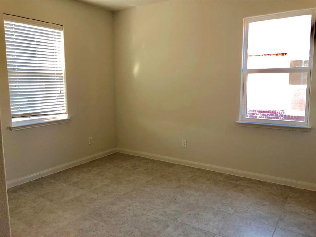 140 Curt Street Anna, TX 75409 - Photo 17 of 25 an empty room with a window