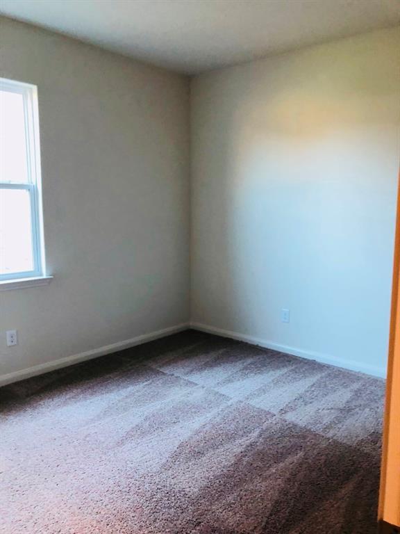 140 Curt Street Anna, TX 75409 - Photo 20 of 25 an empty room with a window
