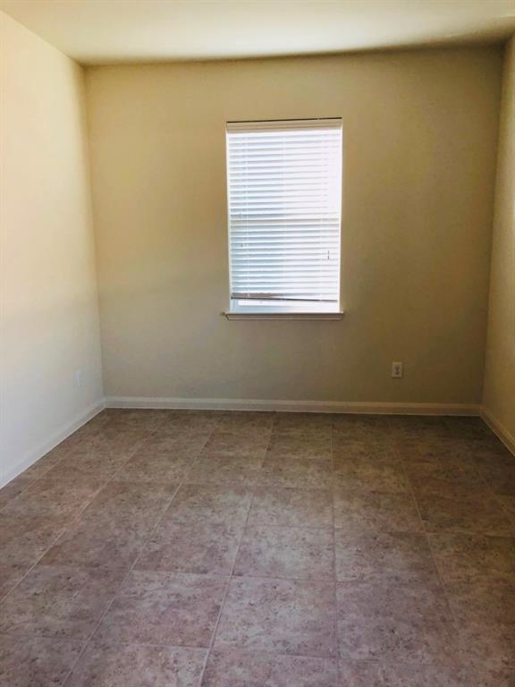 140 Curt Street Anna, TX 75409 - Photo 23 of 25 an empty room with a window