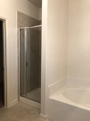 a bathroom with a sink and a bathtub