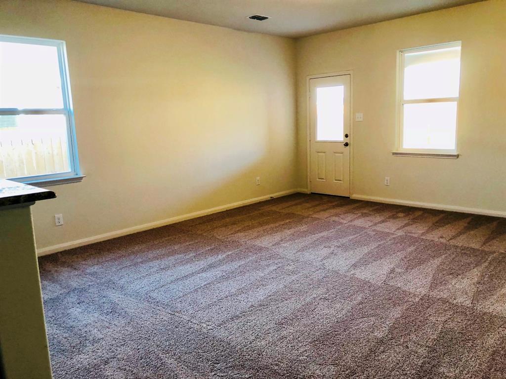140 Curt Street Anna, TX 75409 - Photo 7 of 25 an empty room with a window
