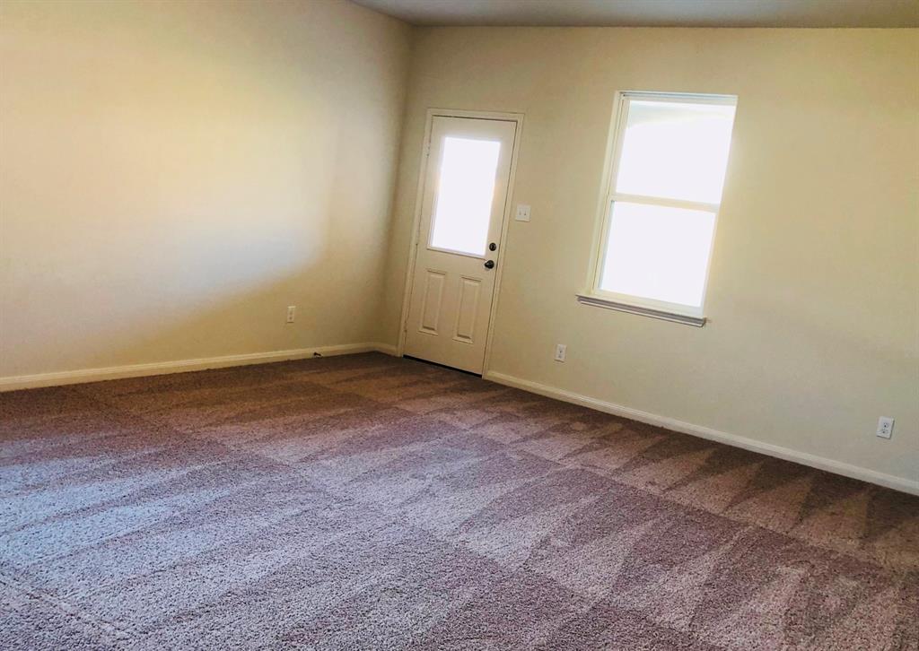 140 Curt Street Anna, TX 75409 - Photo 8 of 25 an empty room with a window