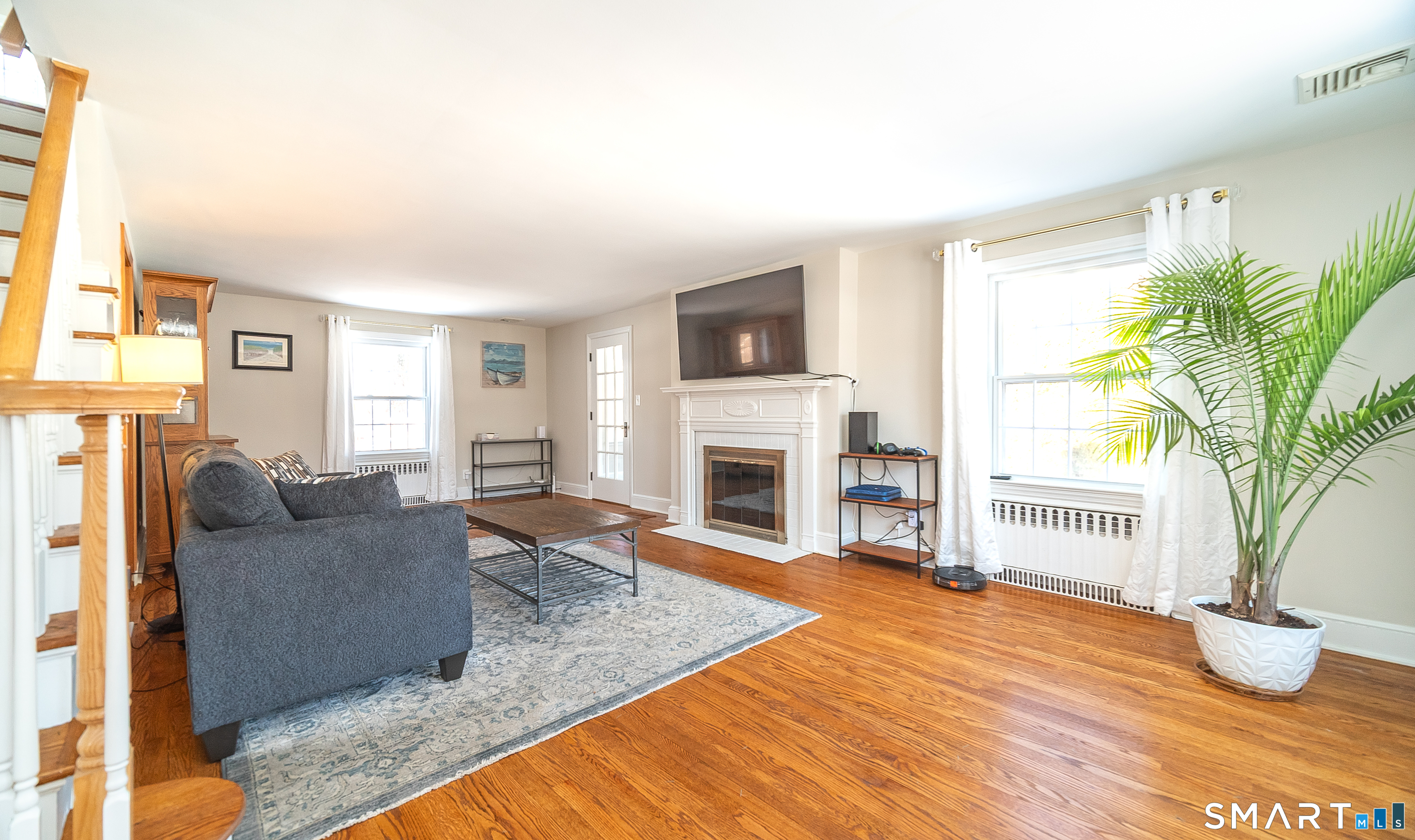 45 Craig Avenue Southington, CT 06489 - Photo 15 of 40 a living room with furniture and a fireplace