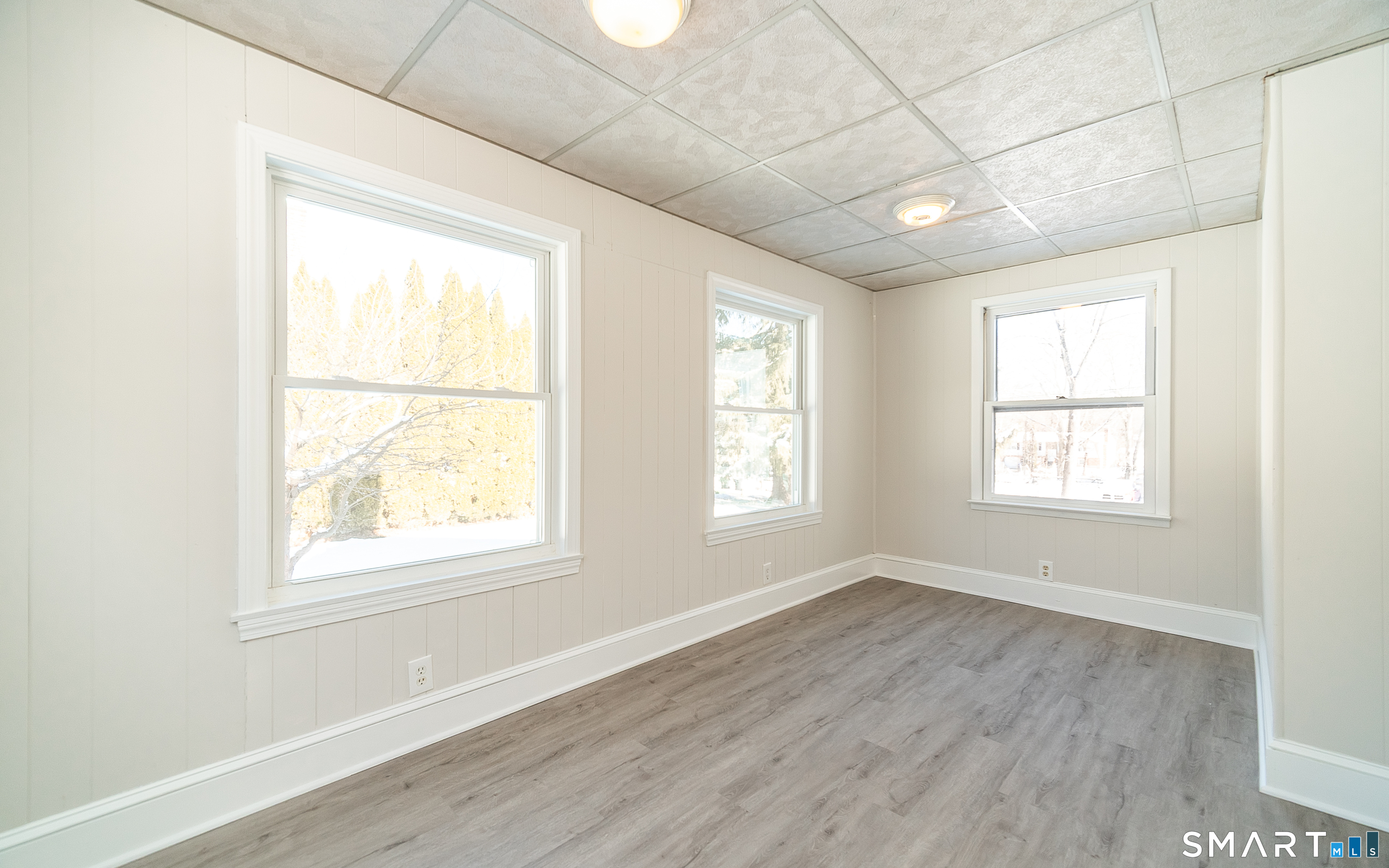 45 Craig Avenue Southington, CT 06489 - Photo 24 of 40 a view of an empty room with wooden floor and a window