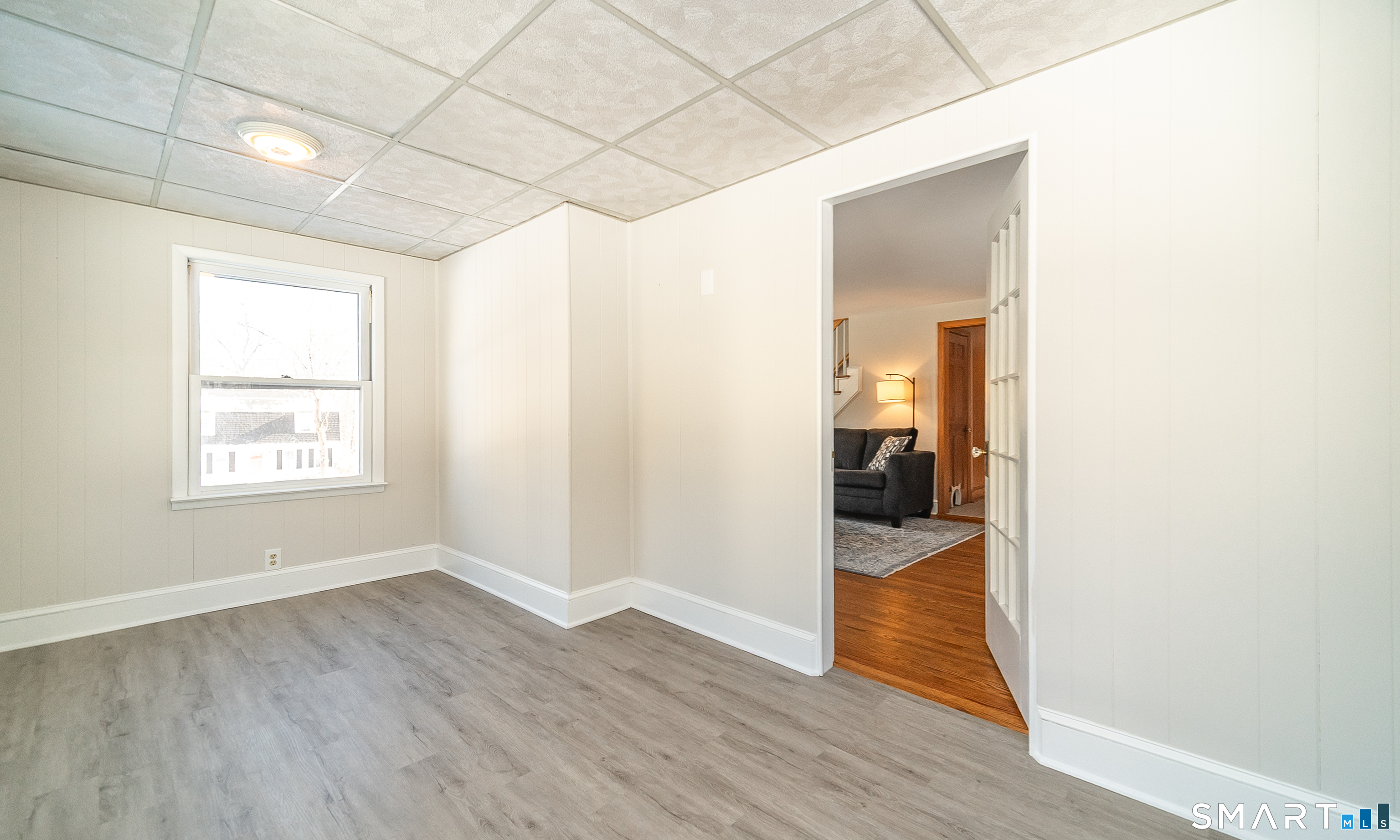 45 Craig Avenue Southington, CT 06489 - Photo 27 of 40 a view of a hallway with wooden floor and a bathroom