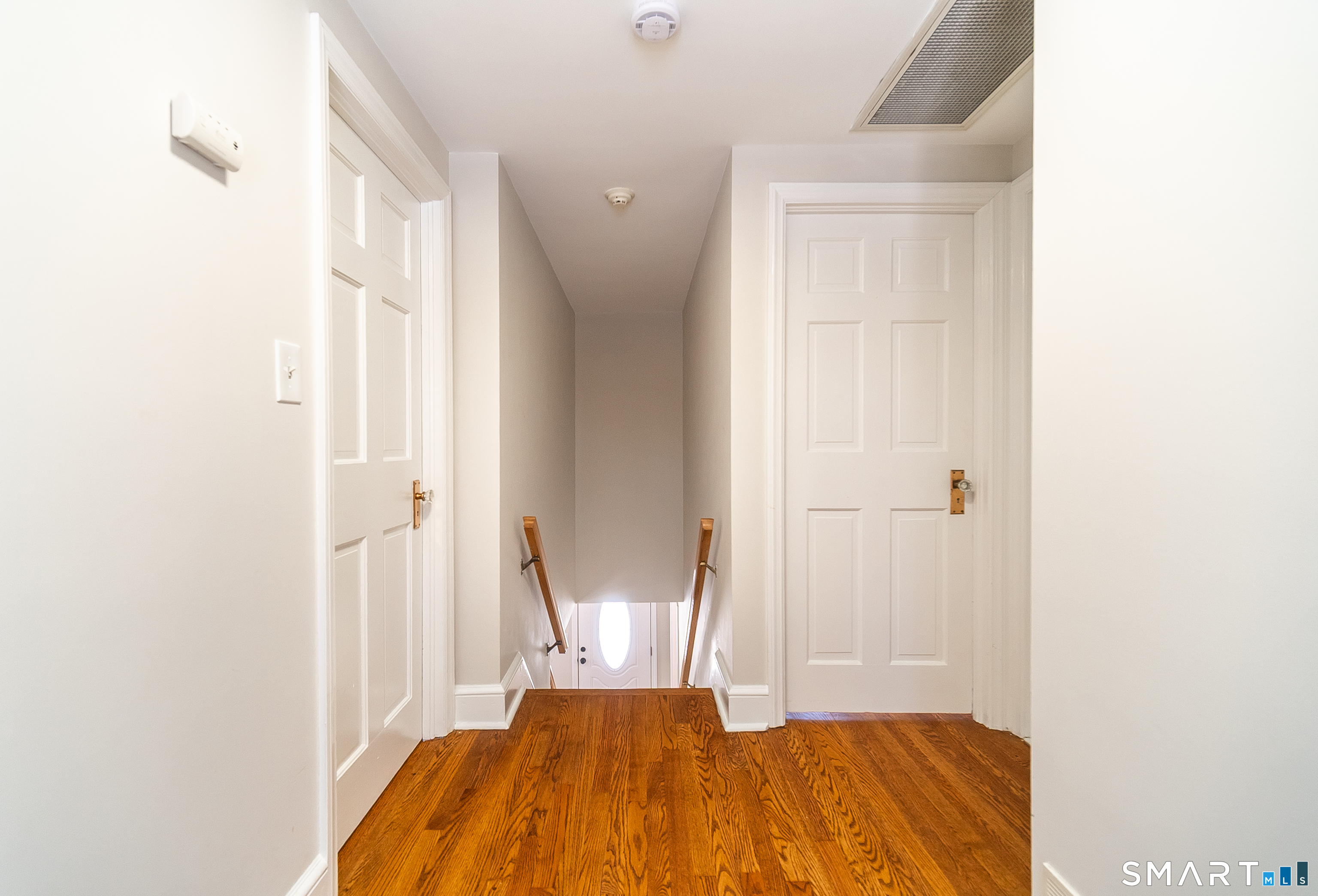 45 Craig Avenue Southington, CT 06489 - Photo 34 of 40 a view of a bedroom with wooden floor and a bathroom