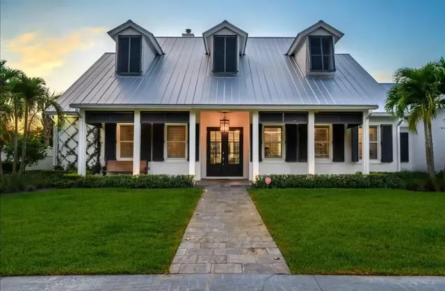 a front view of house with yard